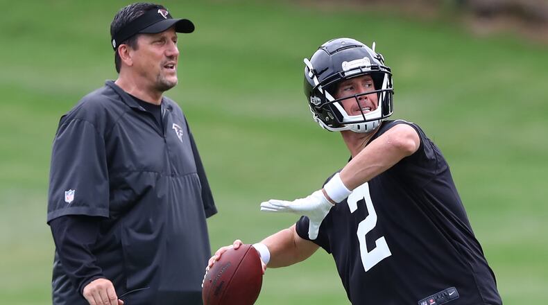 Atlanta Falcons quarterbacks coach Greg Knapp looks on as Matt Ryan throws a pass during team practice on Tuesday, June 5, 2018, in Flowery Branch.  Curtis Compton/ccompton@ajc.com