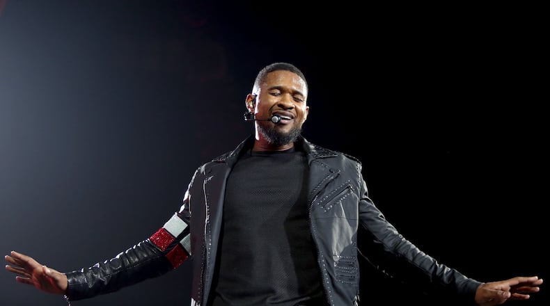 Dec. 9, 2014 - ATLANTA: Usher Terry Raymond IV, commonly known simply as Usher, brings his UR Experience Tour back home to Atlanta performing at the Philips Arena. The RIAA ranks Usher as one of the best-selling artists in American music history, having sold over 23 million in the US alone. (Akili-Casundria Ramsess/Special to the AJC ) Usher made sure his Atlanta show was special. Photo: Akili-Casundria Ramsess/Special to the AJC.