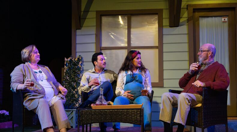 Virginia (Tracey Buot), Pablo (Braian Rivera Jimenez), Tania (Erika Miranda) and Frank (Rial Ellsworth) share a drink on the patio In "Native Gardens." Stage Door Players presents the show through April 28.