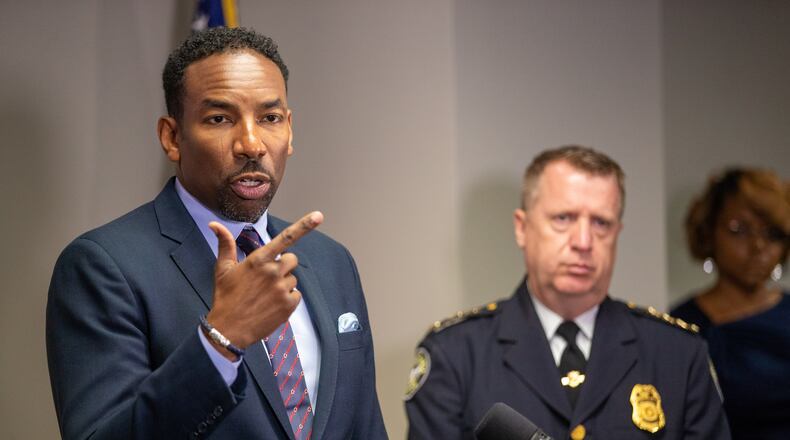 Atlanta Mayor Andre Dickens talks at a press conference as the interim chief of Atlanta Police Darin Schierbaum looks on Tuesday, June 21, 2022.  Steve Schaefer / steve.schaefer@ajc.com)