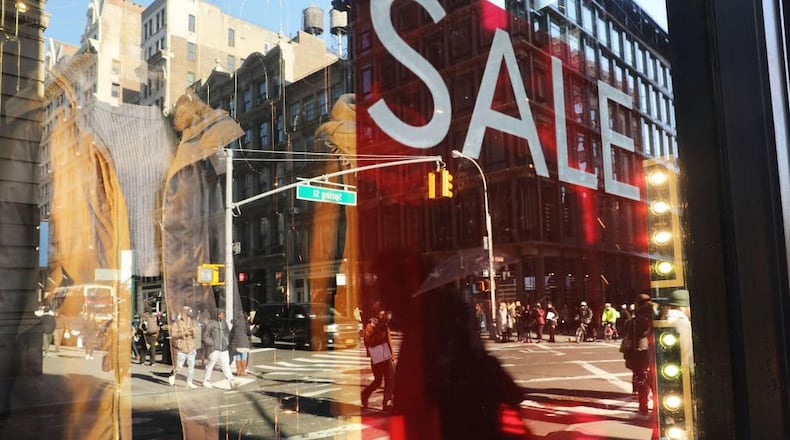 NEW YORK, NY - JANUARY 26: People shop along Broadway in Manhattan on January 26, 2018 in New York City. The Commerce Department said on Friday that the economy grew solidly for a third straight quarter late last year on strong consumer spending and business investment. The nation's gross domestic product increased at a seasonally adjusted annual rate of 2.6%. (Photo by Spencer Platt/Getty Images)