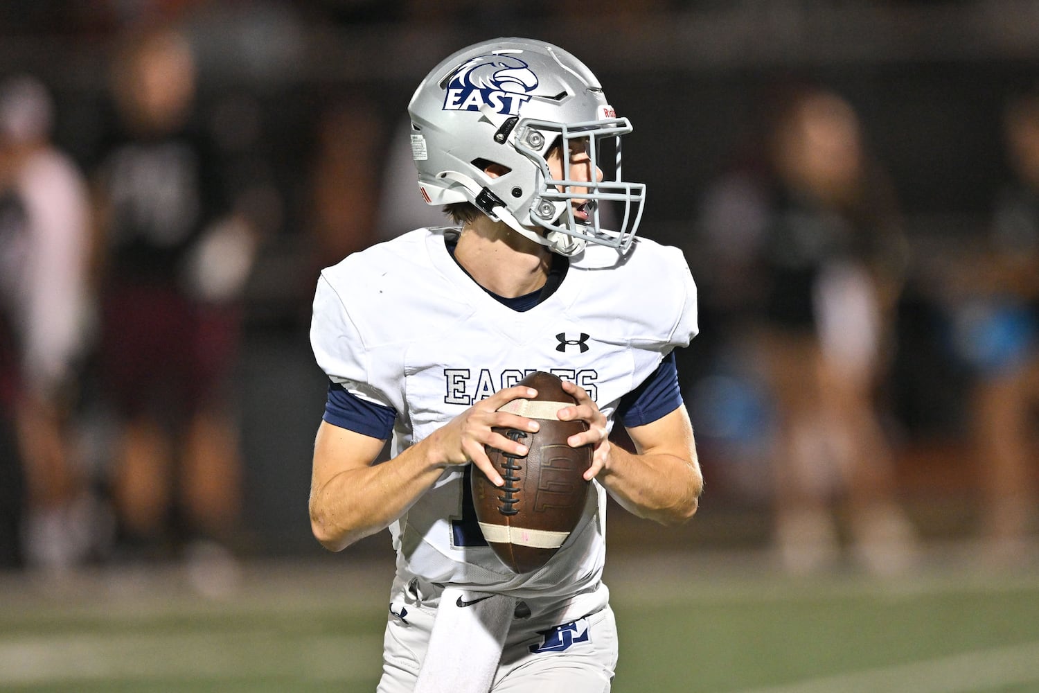 East Jackson quarterback Jayden Gibson drops back in the pocket for a pass during the first half of play Friday, Sept. 26, 2025, at Hebron Christian Academy. (Daniel Varnado for the AJC)