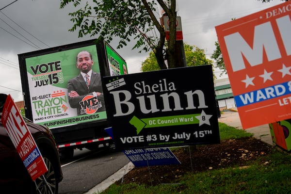 A mobile billboard truck displays a message in support of former District of Columbia Councilman Trayon White outside the Anacostia Neighborhood Library during the Ward 8 special election, Tuesday, July 15, 2025, in Washington. (AP Photo/Julia Demaree Nikhinson)