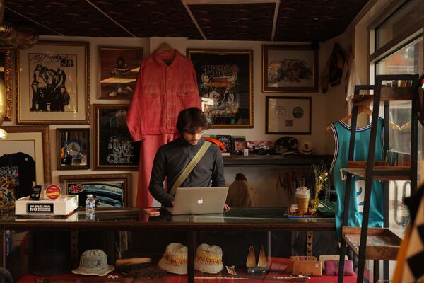 FarReach Vintage sits in the shadow of Bank of America Stadium in the Third Ward neighborhood of Charlotte, N.C., and has a unique and widely celebrated selection of vintage clothing pulled together by owner Carter Seate. (Travis Dove for the AJC)