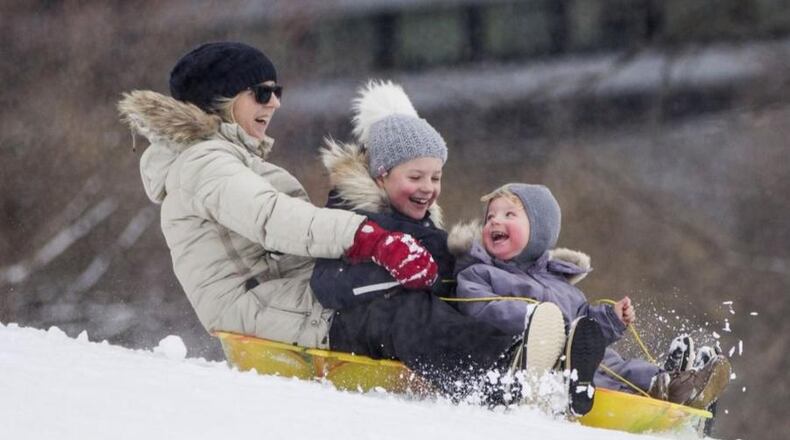 BOSTON, MA - FEBRUARY 13: A woman and her grandchilden sled on Boston Common following a winter storm February 13, 2017 in Boston, Massachusetts. Another winter storm has brought heavy snow and wind to the region. (Photo by Scott Eisen/Getty Images)