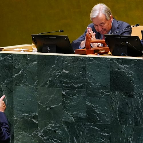 President Donald Trump points toward United Nations Secretary-General Antonio Guterres, after speaking to the United Nations General Assembly, Tuesday, Sept. 22, 2026, at the UN headquarters. (AP Photo/Julia Demaree Nikhinson)