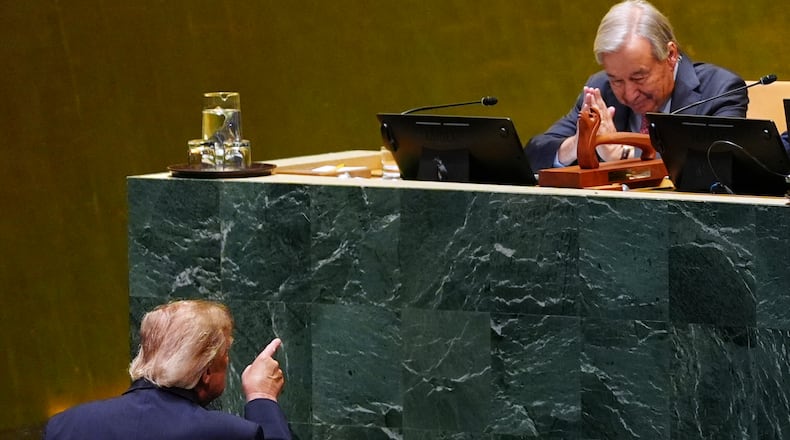 President Donald Trump points toward United Nations Secretary-General Antonio Guterres, after speaking to the United Nations General Assembly, Tuesday, Sept. 22, 2026, at the UN headquarters. (AP Photo/Julia Demaree Nikhinson)