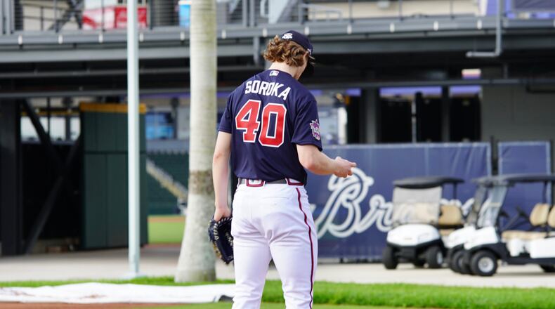 Braves pitcher Mike Soroka - rehabbing an Achilles injury - throws from the mound during the opening of spring training camp Thursday, Feb. 18, 2021, at the team's facility in North Port, Fla.