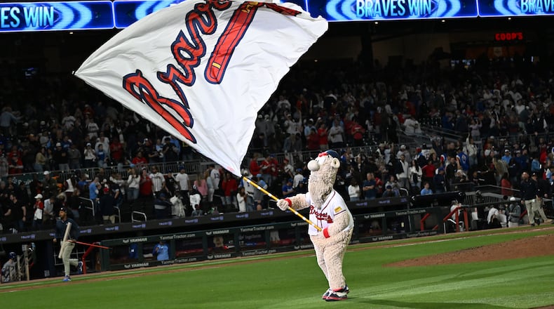 Blooper celebrates the victory over Kansas City Royals during the 9th inning of a baseball game at Truist Park, Saturday, March 28, 2026, in Atlanta. Atlanta Braves won 6-2 over Kansas City Royals. (Hyosub Shin/AJC)