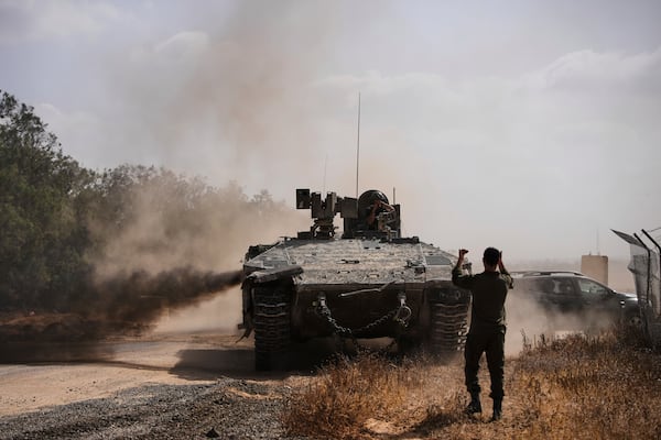 Israeli forces move along the border with the Gaza Strip, in southern Israel, Monday, May 19, 2025. (AP Photo/Ohad Zwigenberg)