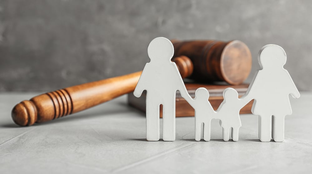 Georgia has suspended or eliminated aimed at helping families and children in foster care. (Dreamstime/TNS)