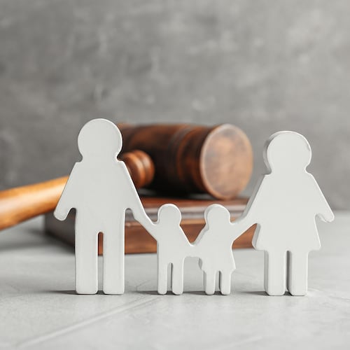 Georgia has suspended or eliminated aimed at helping families and children in foster care. (Dreamstime/TNS)