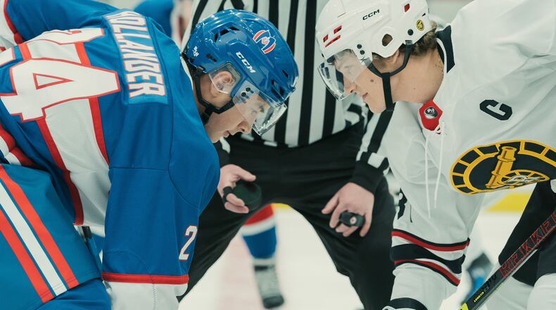 This image released by Crave shows Hudson Williams, left, and Connor Storrie in a scene from "Heated Rivalry." (Crave via AP)