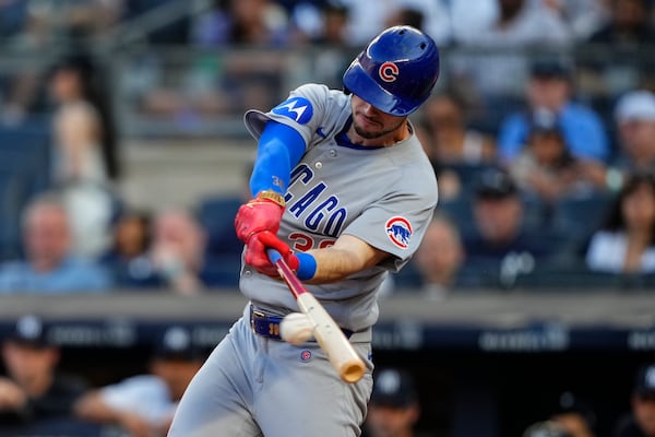 Chicago Cubs' Kyle Tucker hits single during the first inning of a baseball game against the New York Yankees, Friday, July 11, 2025, in New York. (AP Photo/Yuki Iwamura)