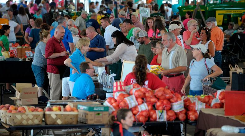 The Georgia Grown Farmers Showcase features agricultural products from all corners of Georgia coming together under one shed for one day on Saturday, July 27, 2013, at the Atlanta State Farmers Market. Farmers and producers shared everything from fruits and vegetables to plants and nursery items, meats and cheeses, grits, honey, barbecue sauces, spices, specialty food items and more. David Tulis / AJC Special