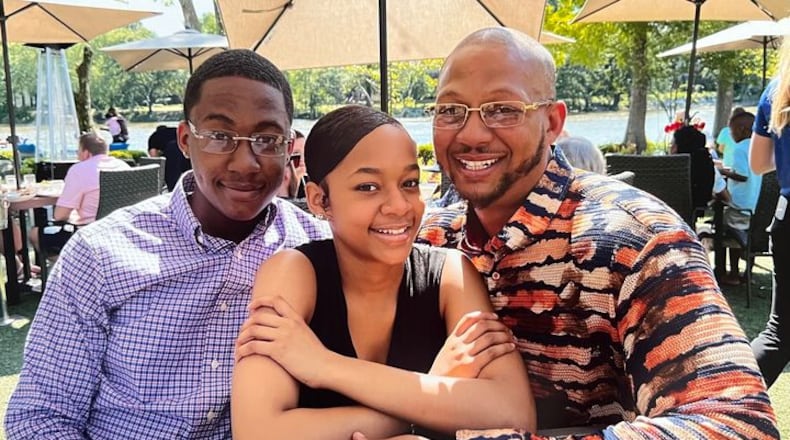 Don Wardlaw with his two children. He was killed in January 2022.