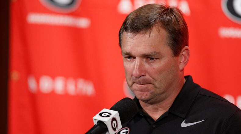Georgia NCAA college football coach Kirby Smart gestures while speaking to the media on the first day of training camp in Athens, Ga., Monday, July 31, 2017. (Joshua L. Jones/Athens Banner-Herald via AP)