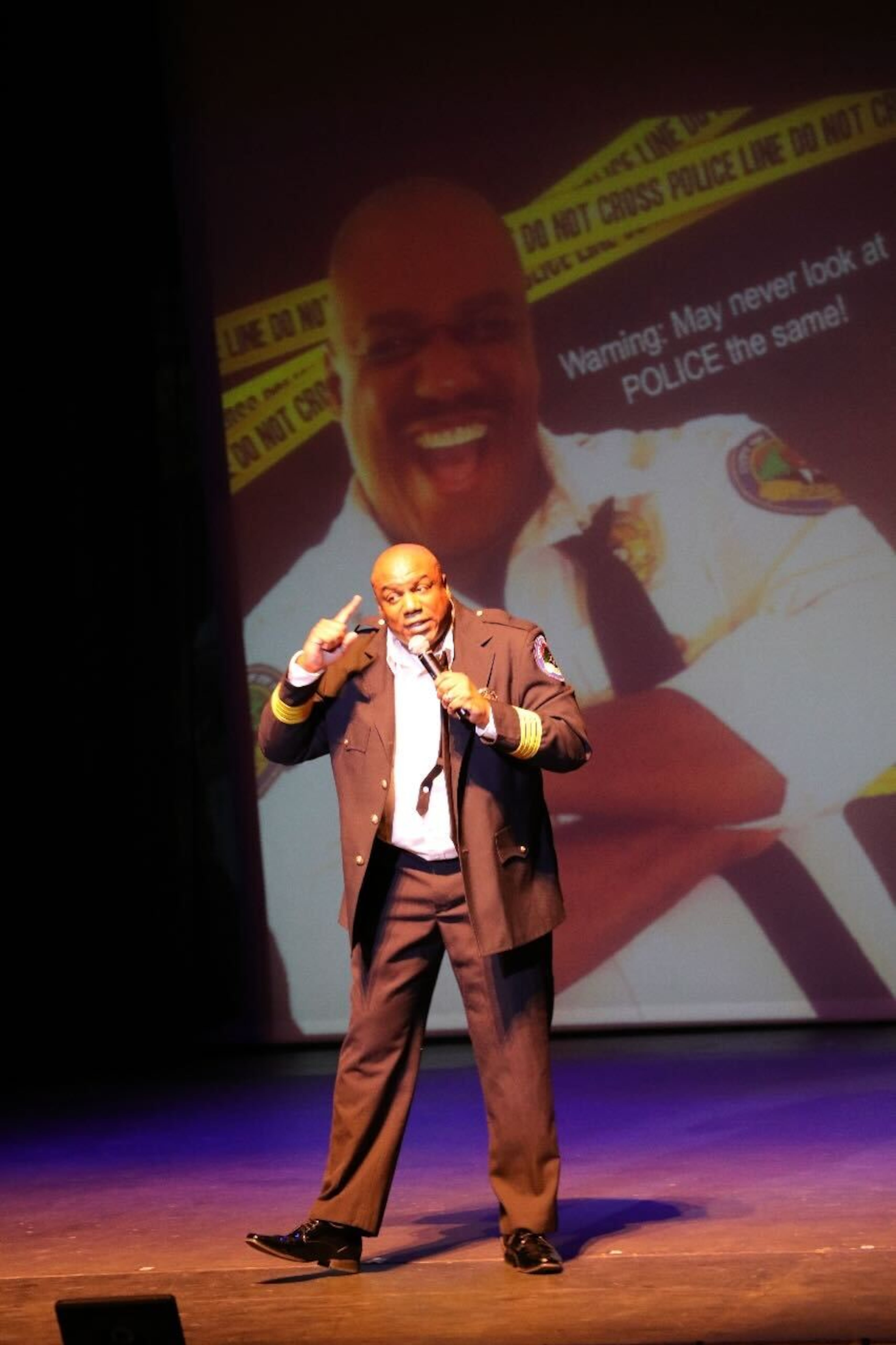 Daryll Triplett onstage Feb. 14, 2019, during his first All Cops Ain't Bad comedy show. (Mike Williams/Courtesy of All Cops Ain't Bad).