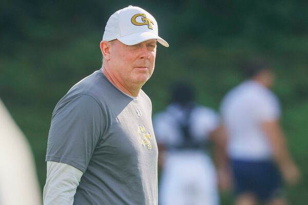 Georgia Tech Offensive Coordinator George Godsey looks at players during a practice at the Georgia Tech football practice facility on Tuesday, August 18, 2026. (Miguel Martinez/AJC)