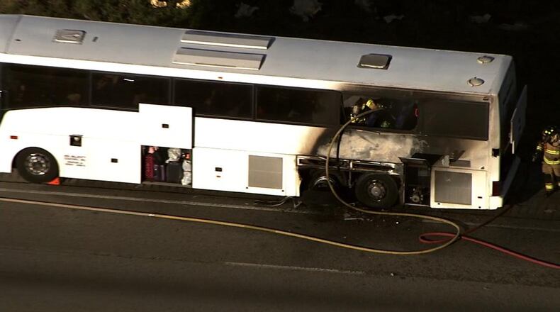 A blown tire led to a charter bus fire in Henry County on Friday. (Credit: Channel 2 Action News)
