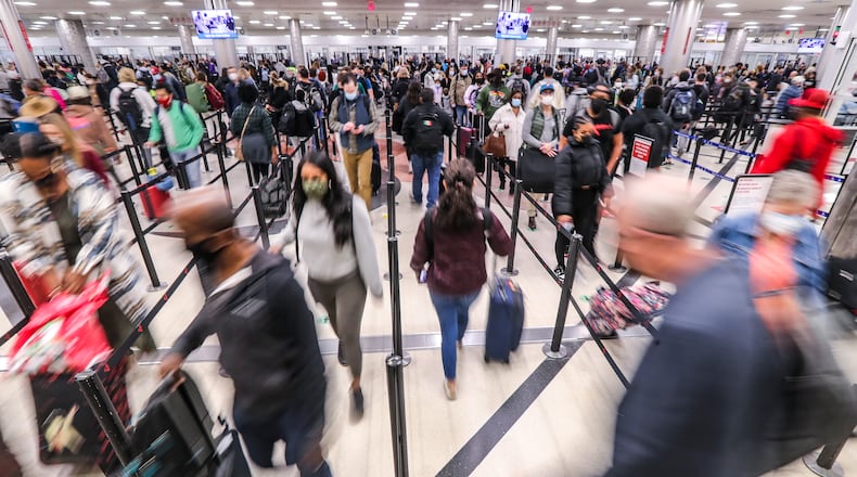 November 19, 2021 Hartsfield-Jackson International Airport: Travelers were abound on Friday, Nov.19,2021 at the domestic side of Hartsfield-Jackson International Airport as the Airport is preparing for an expected 2.22 million passengers for the Thanksgiving travel period starting this Saturday and running through the Monday after the holiday, a rebound from last year when passenger counts were down 40% during the period. The holiday rush will be one of the biggest tests for airlines, which have struggled with staffing shortages and occasional operational meltdowns this year. ÒWe expect it to be very busy and even a bit frenetic at times,Ó said Priceline CEO Brett Keller during a Washington Post Live event this week. With hotels and airlines trying to re-staff after pandemic cutbacks, ÒitÕs going to be a bit crazy this year.Ó Wednesday before the holiday and the Sunday afterward are expected to be the busiest days of the Thanksgiving period, according to travel experts.
AAA predicts 1.6 million people in Georgia will travel for Thanksgiving, including more than 108,000 taking flights. That will bring total traveler counts to a level just 3% shy of 2019 levels, with airline passenger counts within 13% of 2019 levels. Domestic leisure air travel has almost completely recovered to 2019 levels, according to AAA and travel experts. Atlanta-based Delta Air Lines expects to handle as many as 5.6 million passengers from this Friday through the Tuesday after Thanksgiving, nearly three times the 2.2 million it saw during the holiday period last year but still short of the 6.3 million for Thanksgiving 2019. ( John Spink / John.Spink@ajc.com)