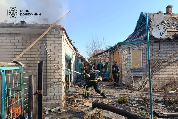 In this photo provided by the Ukrainian Emergency Service, firefighters put out the fire following a Russian attack in Donetsk region, Ukraine, Monday, March 24, 2025. (Ukrainian Emergency Service via AP)
