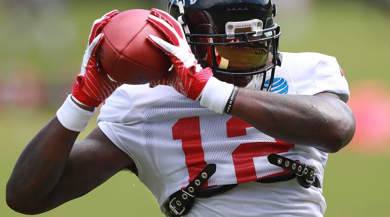 August 7, 2018 Flowery Branch: Atlanta Falcons wide receiver Mohamed Sanu catches a pass during a NFL football training camp practice on Tuesday, August 7, 2018, in Flowery Branch.  Curtis Compton/ccompton@ajc.com