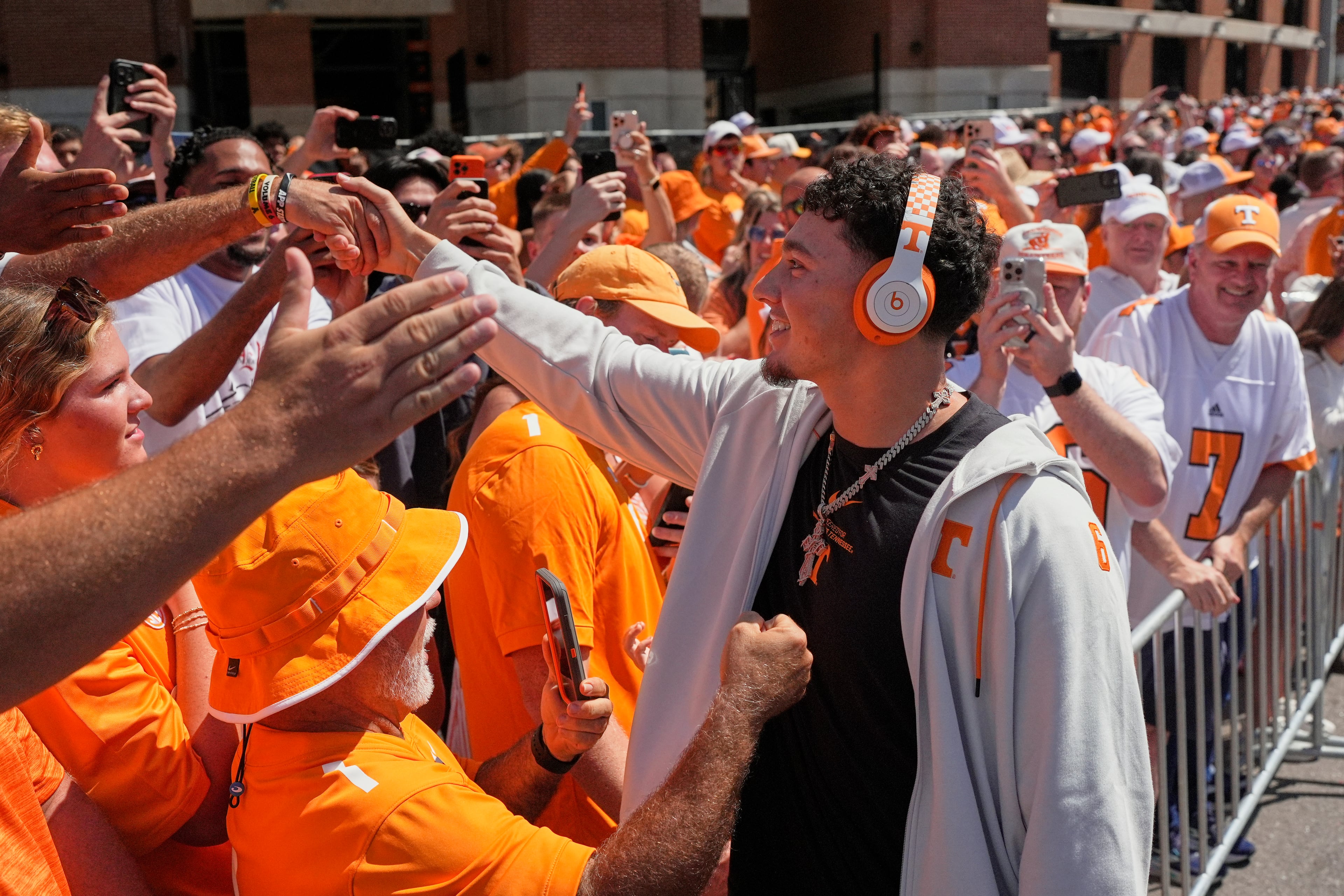 Tennessee quarterback Joey Aguilar greets fans during the team's Vol Walk. The Georgia Bulldogs will be the first real test for Aguilar. (George Walker IV/AP)
