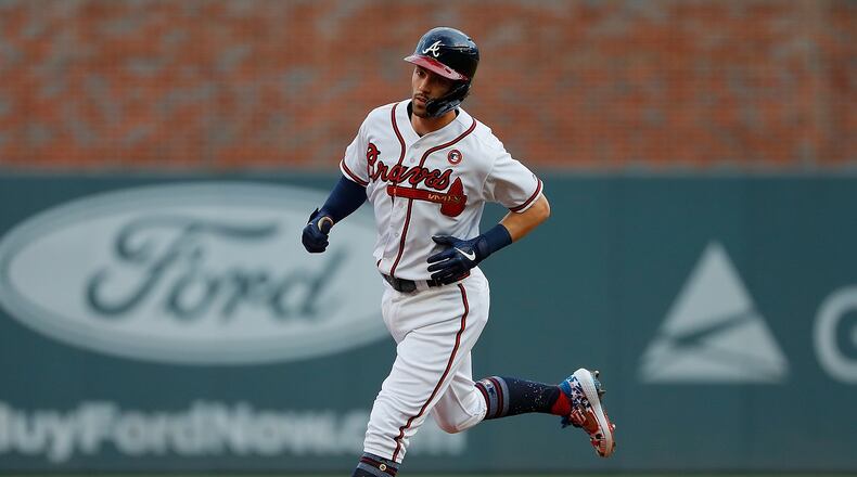 Dansby Swanson #7 of the Atlanta Braves rounds second base after hitting a solo homer in the first inning against the Philadelphia Phillies at SunTrust Park on July 04, 2019 in Atlanta, Georgia. (Photo by Kevin C. Cox/Getty Images)