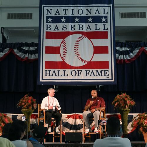 Andruw Jones speaks to members of the press as Craig Muder, communications director, moderates a press conference at the Clark Sports Center on Saturday, July 25, 2026, in Cooperstown, N.Y. Andruw Jones will be inducted into the National Baseball Hall of Fame on Sunday as part of the Class of 2026, alongside Carlos Beltrán and Jeff Kent. Jones will become the 12th player with ties to the Atlanta Braves to be inducted into the Hall of Fame. The beloved Braves center fielder was known for his defensive acumen and towering power. He also exuded a “coolness” that helped make him one of the most popular players in franchise history. (Hyosub Shin/AJC)