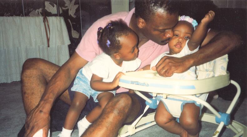 Jimmy Staples with his daughters Jamila (left) and Asha, when they were 2 years old and 6 months, respectively. FAMILY PHOTO
