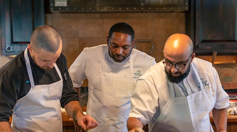 Chef Zouhair Bellout (right) of Reynolds Lake Oconee believes that "an atmosphere of ideas builds confidence." Courtesy of Reynolds Lake Oconee