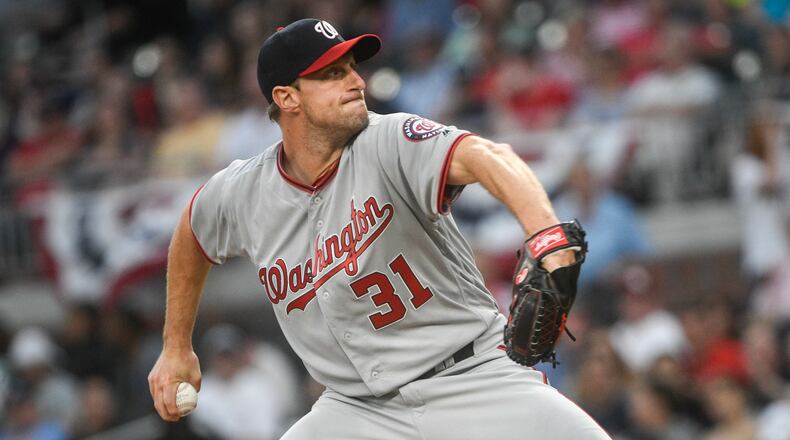 Max Scherzer pitches against the Atlanta Braves during the first inning of a baseball game, Tuesday, April 18, 2017.