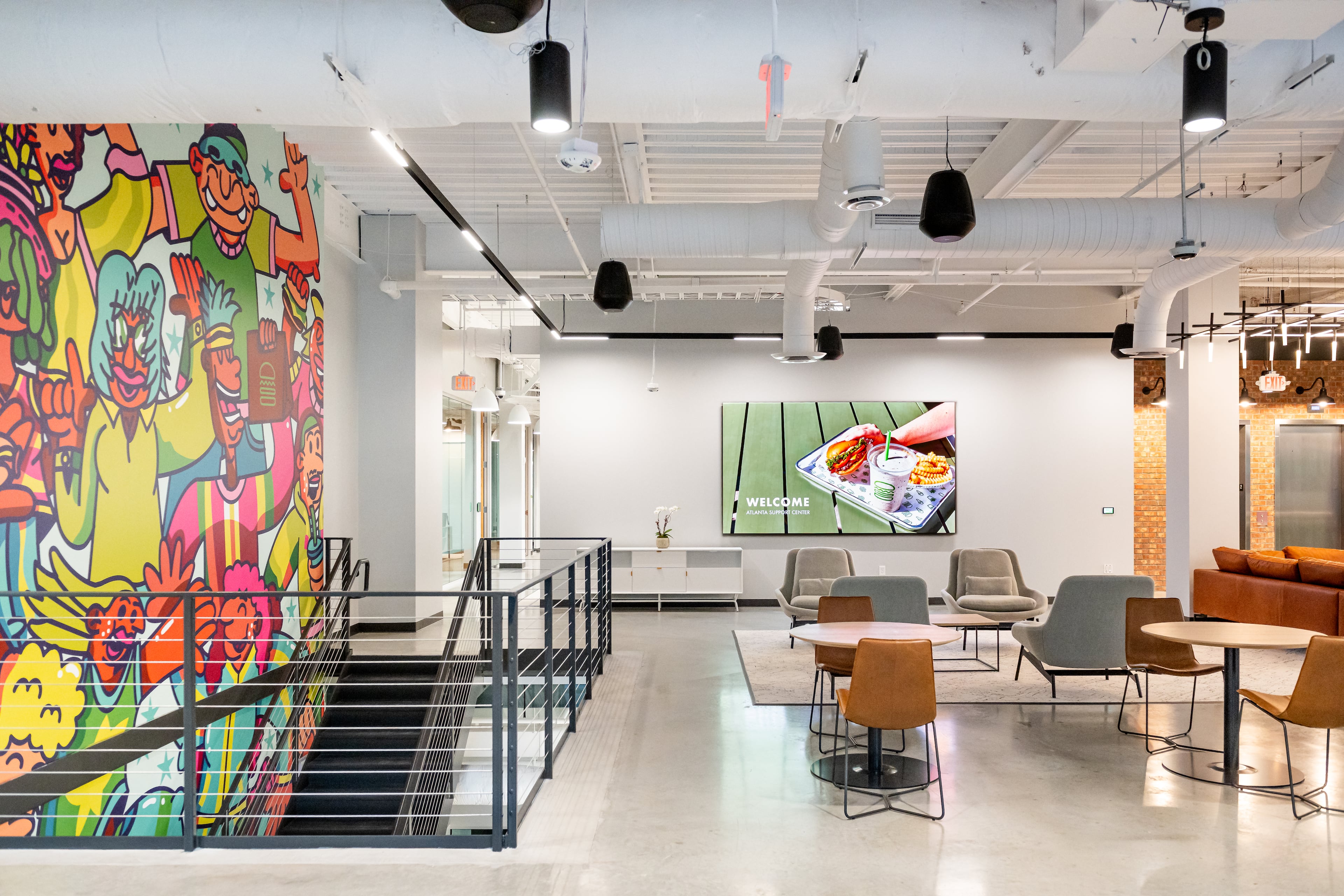 Colorful murals decorate the walls of Shake Shack's new office at The Battery Atlanta. (Courtesy of Lauren Hubbard/Shake Shack)
