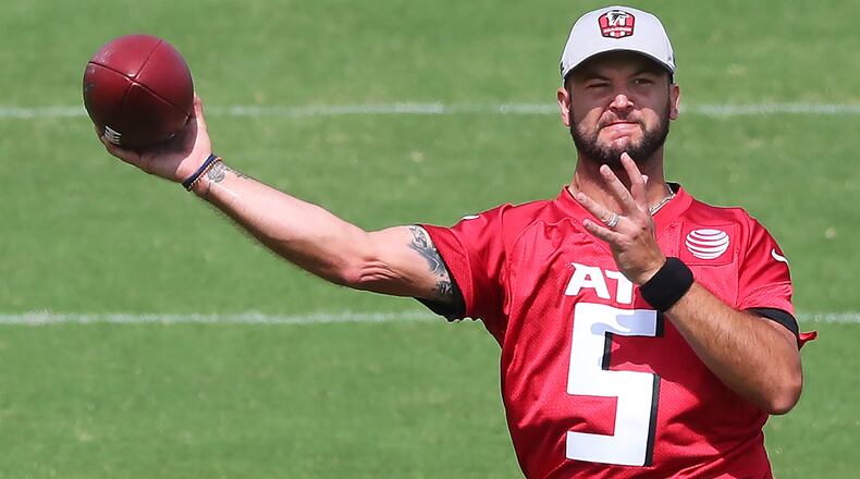 Falcons quarterback AJ McCarron throws a pass during team practice at minicamp Wednesday, June 10, 2021, in Flowery Branch. McCarron is vying to replace Matt Schaub, who retired after the 2020 season, as Matt Ryan's backup. (Curtis Compton / Curtis.Compton@ajc.com)