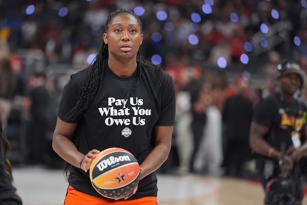 Indiana Fever's Aliyah Boston shoots before the WNBA All-Star basketball game, Saturday, July 19, 2025, in Indianapolis. (AP Photo/Michael Conroy)