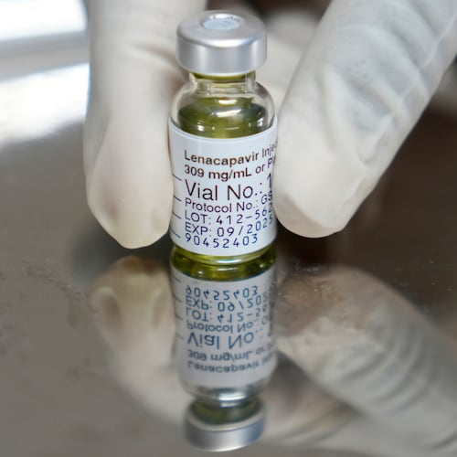 FILE - A pharmacist holds a vial of lenacapavir, an injectable HIV prevention drug, at the Desmond Tutu Health Foundation's Masiphumelele Research Site, in Cape Town, South Africa, July 23, 2024. (AP Photo/Nardus Engelbrecht, File)