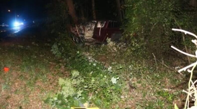 A Gwinnett woman was killed when a pickup truck she was driving ran off the road and into a tree early Monday, police said.