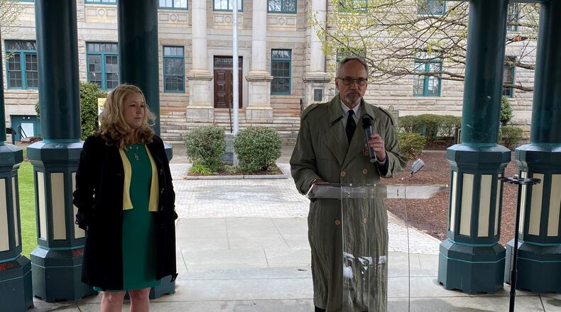 Longtime DeKalb County Commissioner Jeff Rader (right) announced Tuesday he would not be seeking reelection. On Wednesday, he held a press conference to endorse a candidate seeking to fill his shoes: Michelle Long Spears (left).