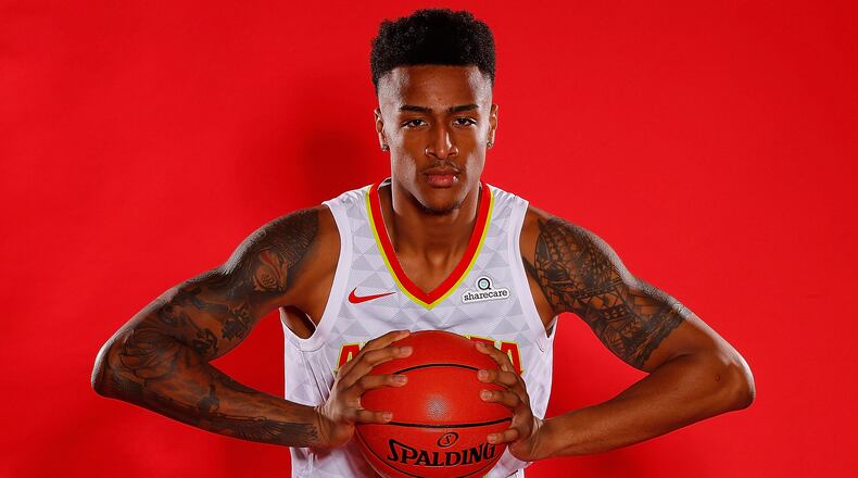 Hawks rookie John Collins poses during media day Sept. 25, 2017, in Atlanta.