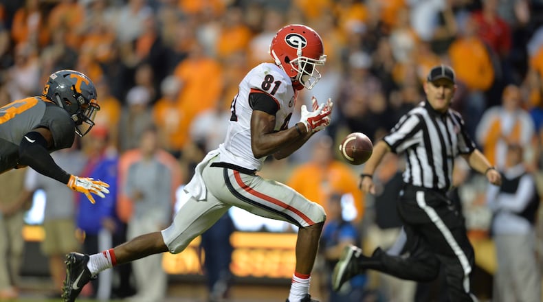 Georgia Bulldogs wide receiver Reggie Davis drops a pass in the end zone late in the 4th quarter as Tennessee Volunteers defensive back Malik Foreman defends in Knoxville, TN Saturday October 10, 2015. BRANT SANDERLIN/BSANDERLIN@AJC.COM