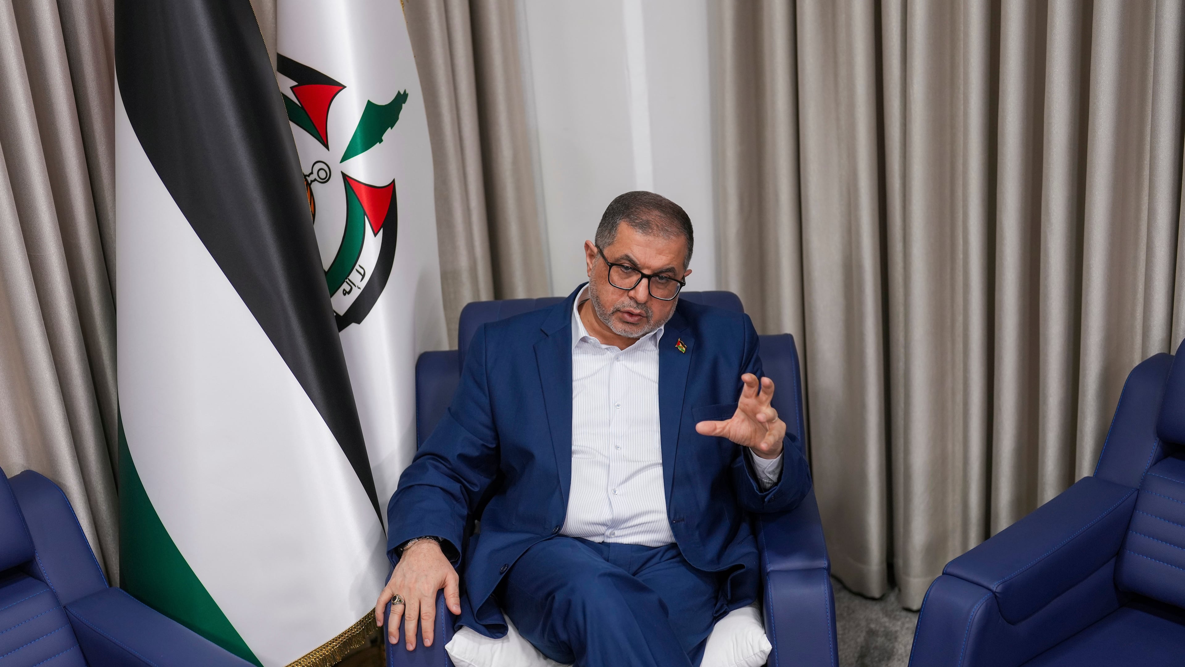 FILE - Bassem Naim, an official in Hamas' political wing, speaks in Istanbul, Turkey, Thursday, Dec. 5, 2024. (AP Photo/Francisco Seco, File)