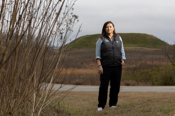 Tracie Revis, acting CEO of the Ocmulgee National Park and Preserve Initiative, in front of Great Temple Mound at Ocmulgee Mounds National Historical Park.