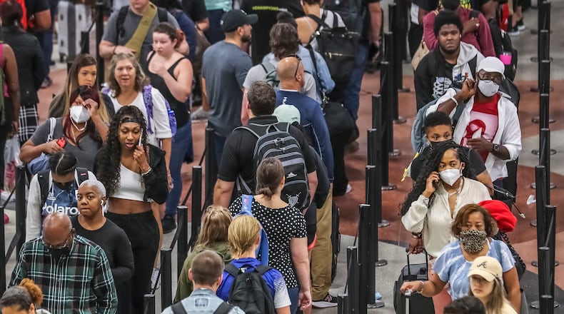 September 1, 2022 Hartsfield-Jackson International Airport: Travelers in the main security line swelled Hartsfield-Jackson International Domestic Airport on Thursday , Sept. 1, 2022 as Labor Day weekend is expected to bring a rush of traffic on the roads and in the skies as the last holiday of this year’s busy and tumultuous summer travel season. Hartsfield-Jackson International Airport expects to handle 1.6 million passengers over the Labor Day travel period from Thursday through Tuesday, Sept. 6. The Atlanta airport said Friday is likely to be the busiest day of the travel period, with more than 300,000 passengers expected. Airport officials advise travelers to be in the airport terminal at least two hours before departure. The airport’s forecast indicates bigger crowds for Labor Day than last year, when travel was stymied by the spread of the delta variant of COVID-19 and the holiday period drew about 1.3 million passengers. Other busier holiday weekends have brought larger crowds this summer, including Memorial Day and the Fourth of July. Atlanta-based Delta Air Lines and other carriers have struggled to keep flights operating on time when weather disruptions threw schedules into disarray, causing flight cancellations and travel disruptions during some of the busiest periods. Delta said it has worked this summer to restore its operational reliability. The hassles of air travel have prompted some to decide to drive instead of fly, according to one survey. About 32% of those surveyed by AAA said they plan to travel for Labor Day weekend, and of those, 82% plan to drive. (John Spink / John.Spink@ajc.com)