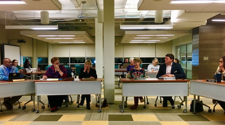 L-R, Commissioner Tony Powers, City Manager Peggy Merriss, Mayor Patti Garrett, School Board Chair Annie Caiola and Superintendent David Dude during a Nov. 9 joint session between commissioners and board members. Regarding annexation Merriss told the gathering, “I think we have a year to figure things out.” Bill Banks for the AJC