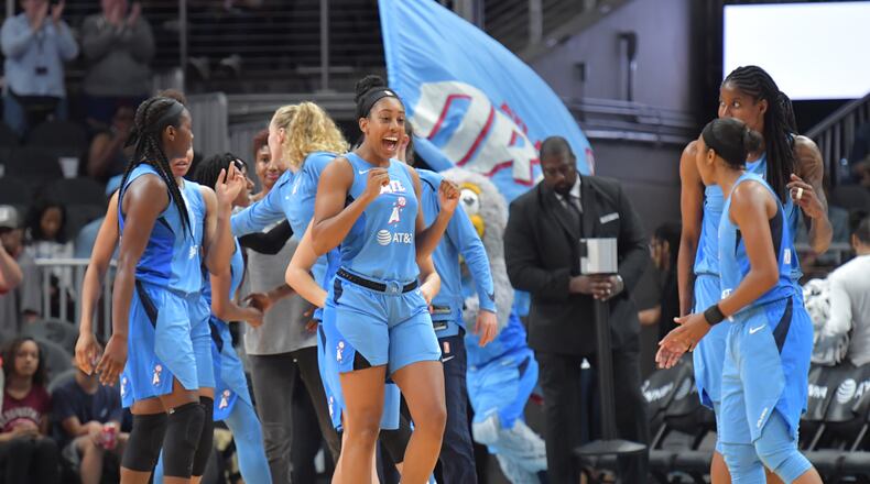 June 19, 2019 Atlanta - Atlanta Dream forward Monique Billings (center) and teammates celebrate their victory over the Indiana Fever during WNBA basketball game at State Farm Arena in Atlanta on Wednesday, June 19, 2019. Atlanta Dream won 88-78 over the Indiana Fever. HYOSUB SHIN / HSHIN@AJC.COM
