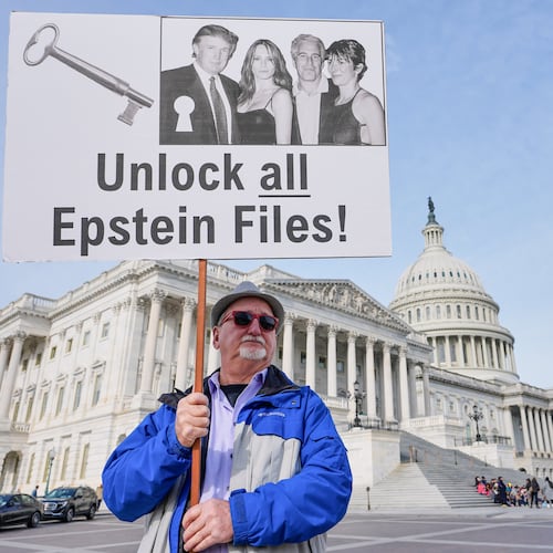 Gary Rush of College Park, Maryland, protests before a news conference on the Epstein files in front of the Capitol in November. (Mariam Zuhaib/AP)
