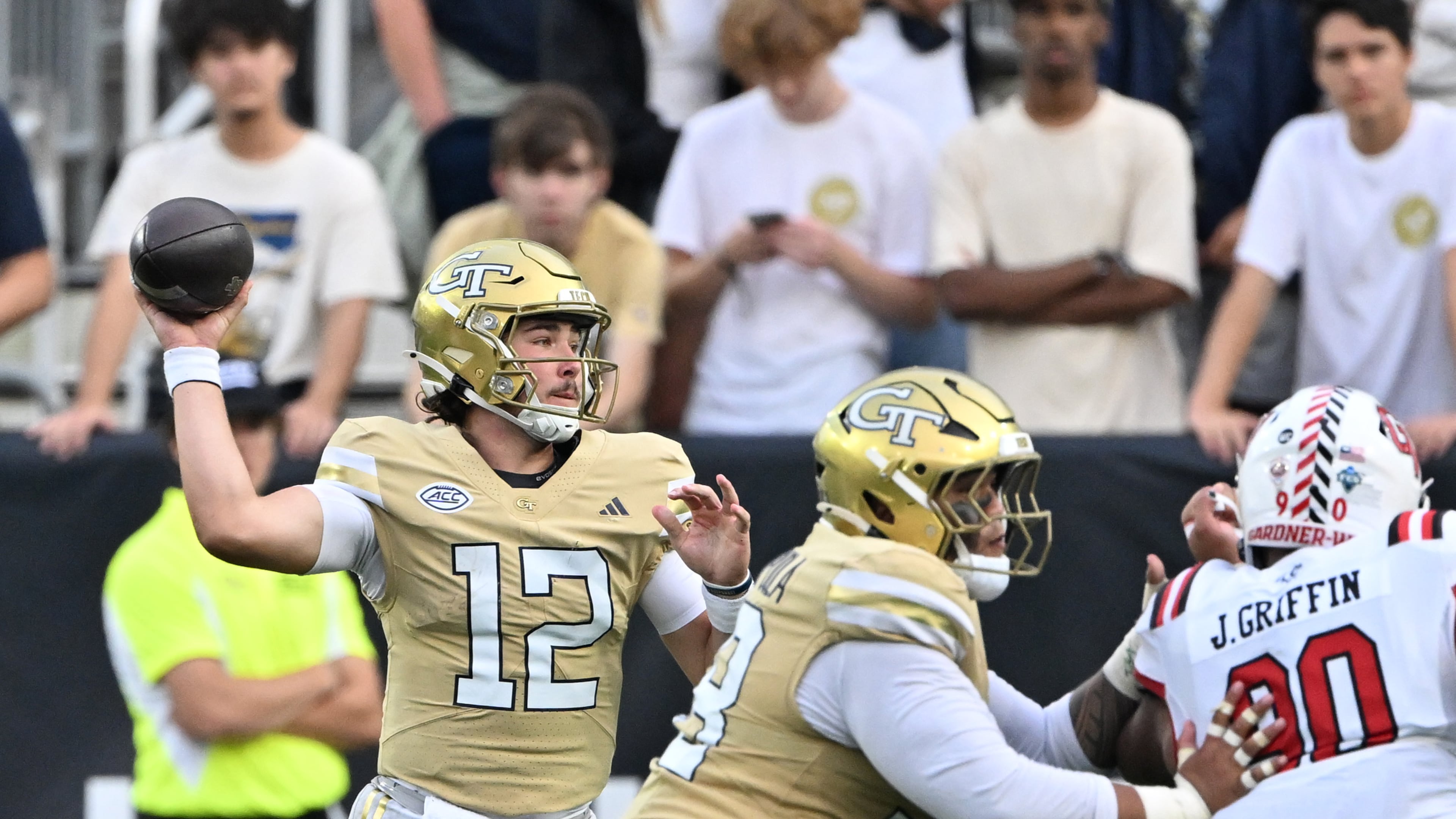 Georgia Tech quarterback Aaron Philo (12) gets off a pass during the second half of an NCAA college football game at Georgia Tech's Bobby Dodd Stadium, Saturday, November 6, 2025 in Atlanta. Georgia Tech won 59-12 over Gardner-Webb. (Hyosub Shin / AJC)