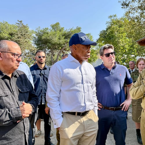 This image released by the Mayoral Photography Office shows New York Mayor Eric Adams, second left, during his visit to Kibbutz Kfar Aza, Nov. 18, 2025, which was attacked during the October 7th terrorist attacks on Israel. (Benny Polatseck/Mayoral Photography Office via AP)