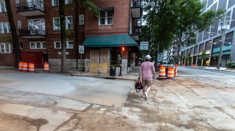 Dried Concrete was all that was left to see at the infamous 11th Street water main break Thursday morning, June 6, 2024. Thursday morning, the city announced that the boil water advisory had been lifted, six days after the ordeal began. Now, the focus is on fixing the outdated infrastructure. Atlanta Mayor Andre Dickens said he will rely on the experts and how the city will proceed. (John Spink/AJC)